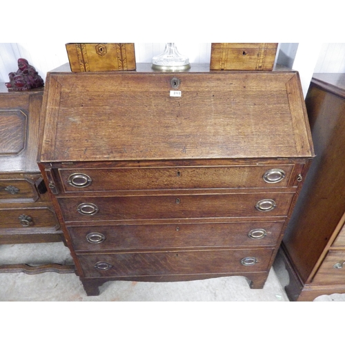 2113 - A Georgian oak four drawer bureau   (R)  £20