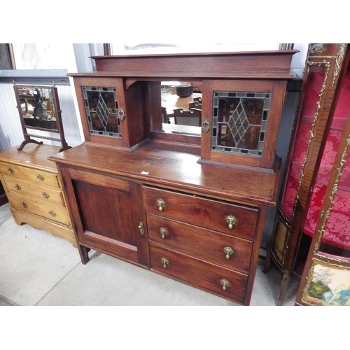 2131 - A 1930's oak and lead glazed dresser