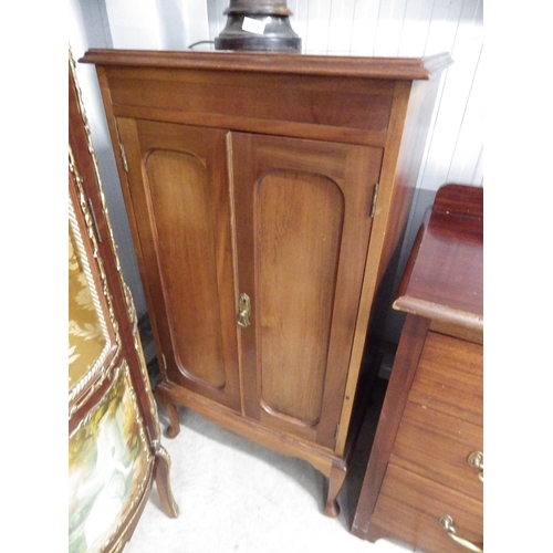 2136 - A 1930's mahogany two door cupboard