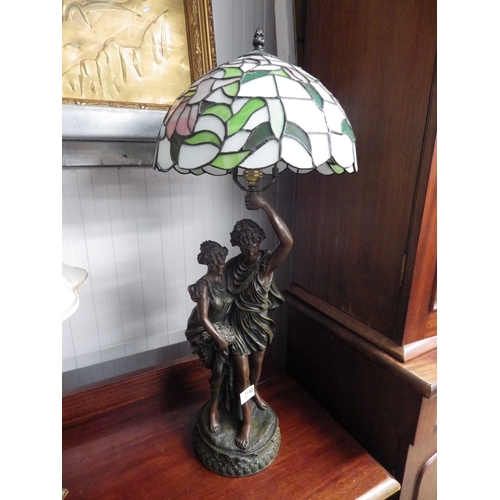 2140 - A figural lamp with Tiffany shade and a brass lamp