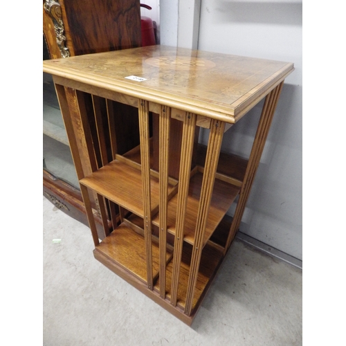 2146 - A walnut revolving bookcase