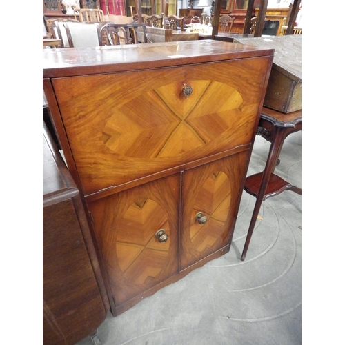 2183 - A 1950's walnut cocktail cabinet    (R)  £20