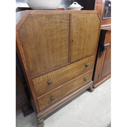 2211 - A 1950's oak two door, two drawer unit