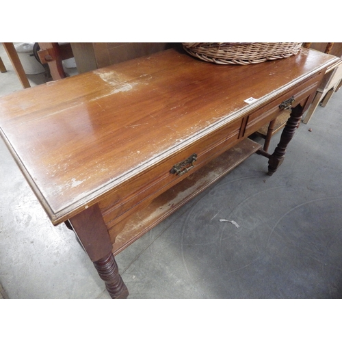 2221 - An Edwardian walnut two drawer side table/washstand    (E)  £10-15