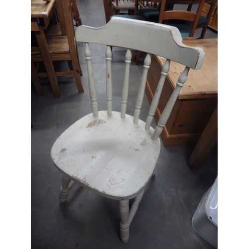 2263 - A pair of painted pine spindle back chairs