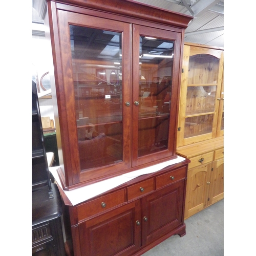 2307 - A modern cherrywood glazed dresser with three drawer over two door base and shelved interior