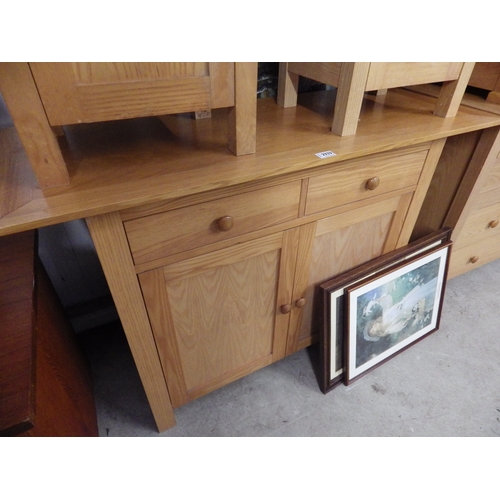 2333 - A modern light oak two drawer over two door side cabinet