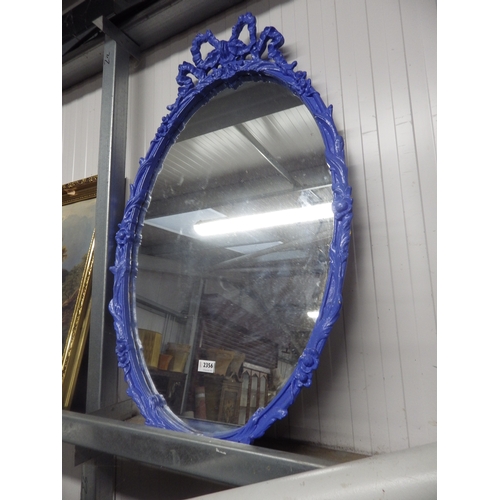 2356 - A blue over gilt painted oval ribbon mirror   (E)  £20-30