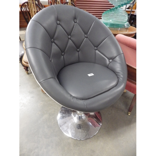 2371 - A modern egg chair and a modern circular top table