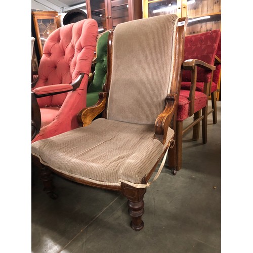 2403 - A Victorian mahogany framed fire side arm chair for reupholstery  (R)