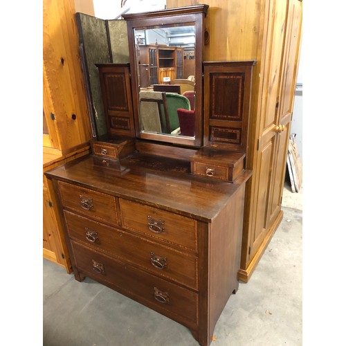 2407 - In the manner of 'Liberty & Co' an Arts & Crafts crossbanded mahogany dressing chest