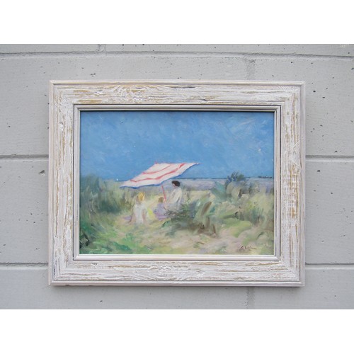 6068 - GEOFFREY WILSON (1920-2010) A framed oil on board - Figures on Walberswick Beach, Suffolk. Signed bo... 