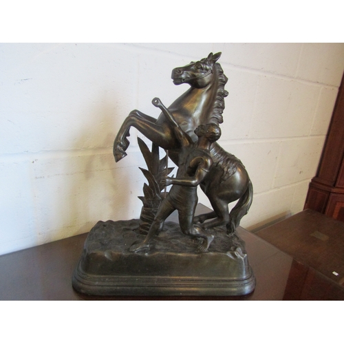 1035 - A pair of spelter bronze finish Marley horses, no harnesses, 40cm tall
