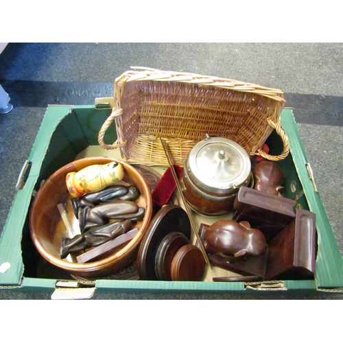 1242 - A box of treen including bowl, tea caddy and elephant bookends