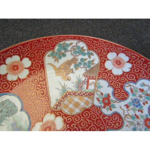 1355 - A Chinese charger in famille rose colour palette, panels of birds and flowers, 46cm diameter     (R)... 