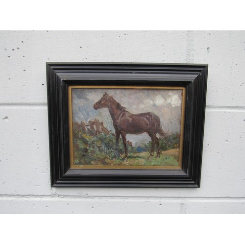 6109 - MARGARET THEYRE (1897-1977) A framed and glazed oil on board of a black horse in landscape. Signed b... 