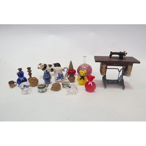 1309 - A box of miscellaneous miniatures to include stoneware jug and tyg, brass candlesticks, blue and whi... 