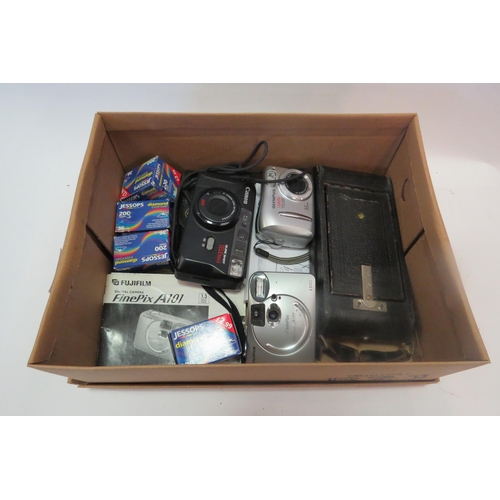 1310 - A box of miscellaneous cameras to include Canon Sureshot, Telemax and four boxes of film