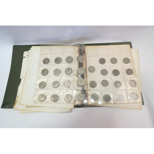 1311 - A album containing coins including half pennies