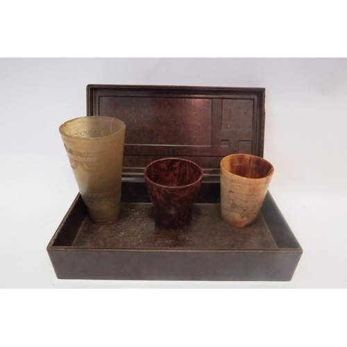 1325 - A Bakelite rectangular box, eggcup and two horn miniature tumblers (4)