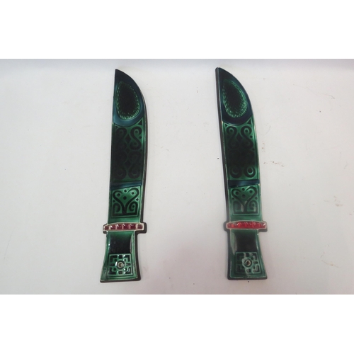 1334 - A pair of Poole Pottery daggers designed by Robert Jefferson, 31cm long