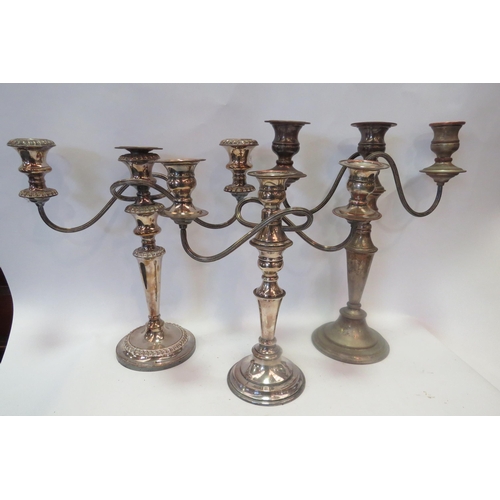 1372 - Three silver plated triple sconce candle sticks