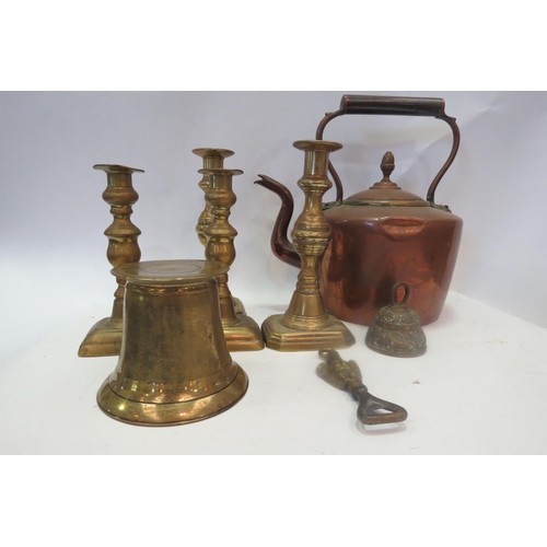 1384 - A box of metal ware including copper kettle, two pairs of brass candlesticks, pestle etc