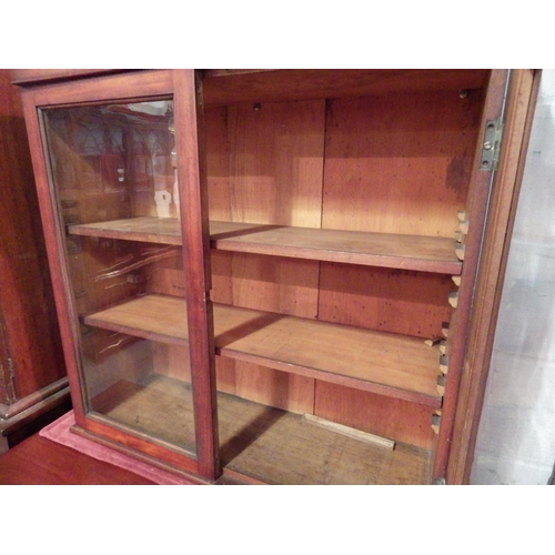1028 - A Victorian mahogany two door wall hanging glazed bookcase with key, 80cm tall x 82cm wide x 29cm de... 