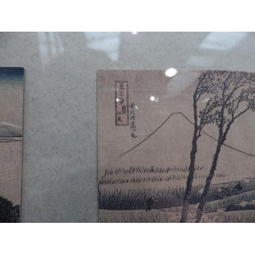 1043 - Two framed and glazed displays of Japanese landscape postcards including bridge scene, 57cm x 57cm i... 