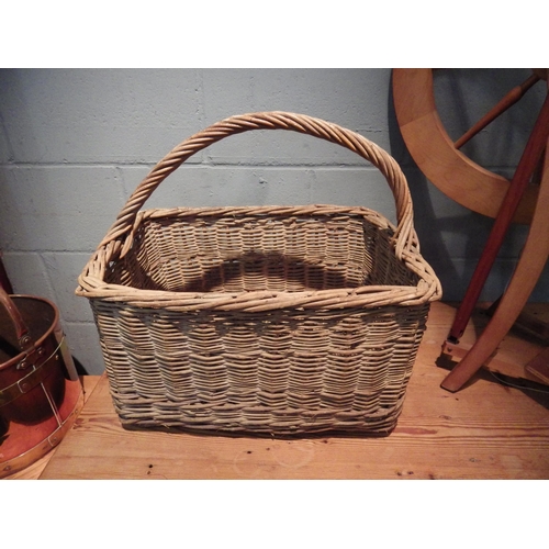 1073 - A wicker basket of rectangular form, 53cm x 36cm