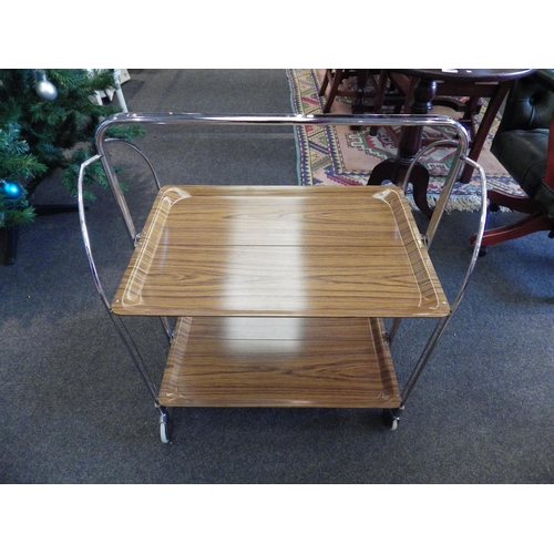 1091 - A retro chrome frame folding trolley with plastic wood effect trays