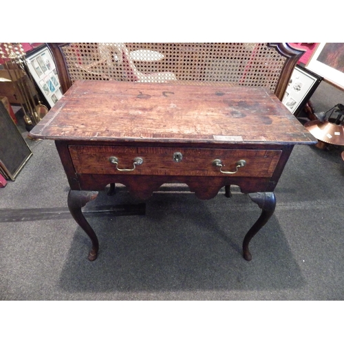 1098 - A Georgian oak side table, single drawer with brass swan neck handles, cabriole legs (a/f) 72cm tall... 