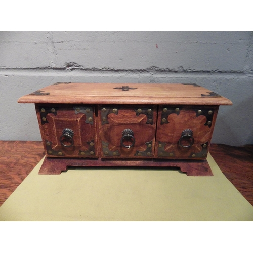 1107 - A small set of three wooden drawers, 15cm tall x 34cm long x 14.5cm deep