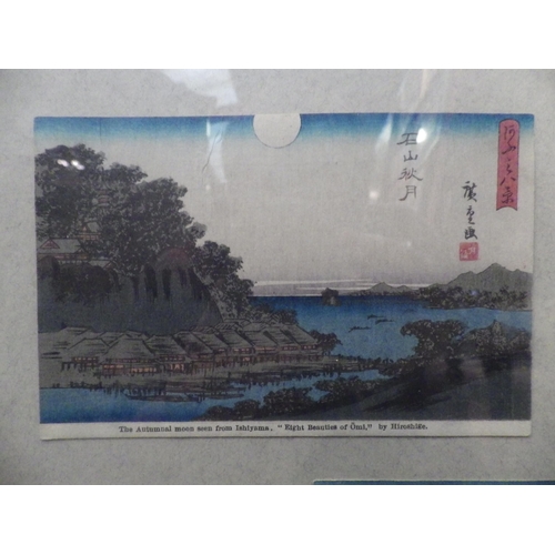 1115 - Two framed and glazed displays of Japanese landscape postcards including sailing vessels, 57cm x 57c... 