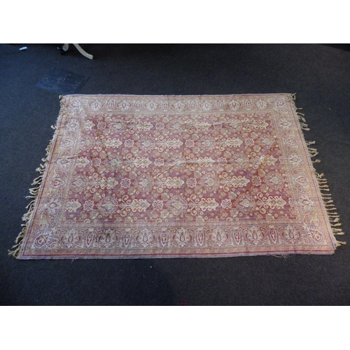 1136 - An Eastern rug, terracotta ground, central panels, multiple borders, tasselled ends, a/f, 184cm x 12... 