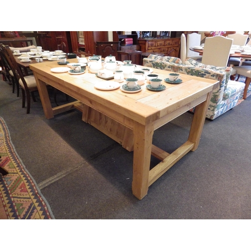 1142 - An oak refectory style table joined by 