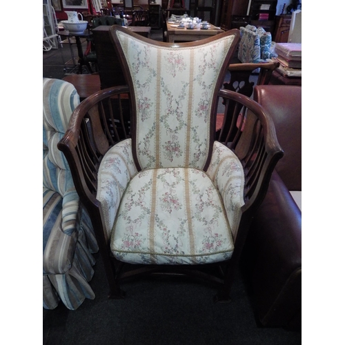 1157 - An Edwardian inlaid bedroom chair, high galleried arms, floral upholstery