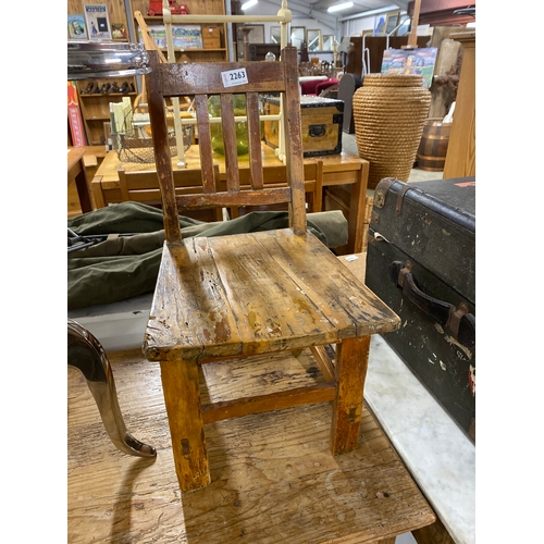 2263 - A rustic provincial Irish pine child’s chair