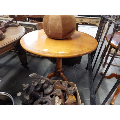 2250 - A reproduction Georgian wine tables, the circular top over a turned column to tripod base