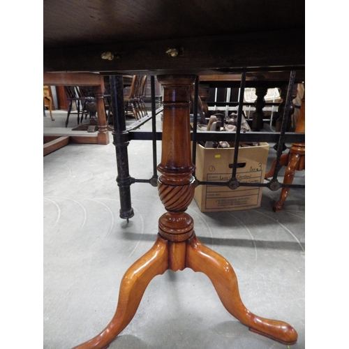 2252 - A pair of reproduction Georgian wine tables, the circular top over a turned and spiral carved colum ... 