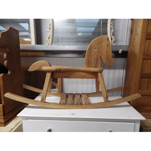 2316 - A Childs pine rocking horse