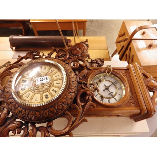 2375 - Two wall hanging clocks