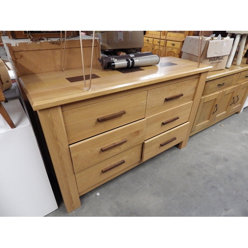 2380 - A modern oak chest of six drawers