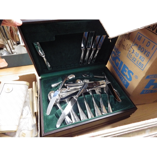 2401 - Two completed sets of canteens of cutlery