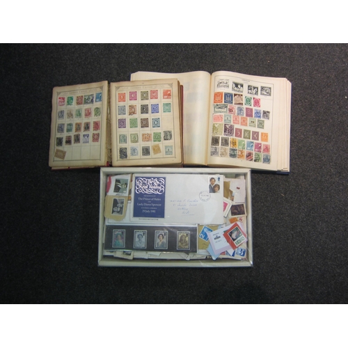 1182 - Two world stamp albums and loose examples