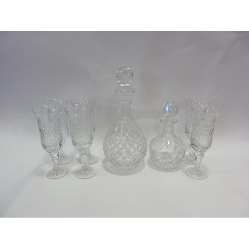 1186 - Six crystal hobnail cut champagne flutes, a similar decanter of bulbous form, 28cm tall and a smalle... 