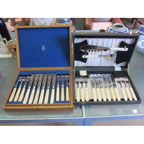 1193 - An oak cased canteen of fish cutlery and one other