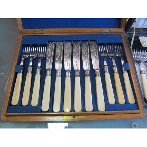 1193 - An oak cased canteen of fish cutlery and one other