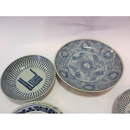 1198 - A collection of blue and white Oriental plates/ dishes, some bearing backs to underside, some a/f