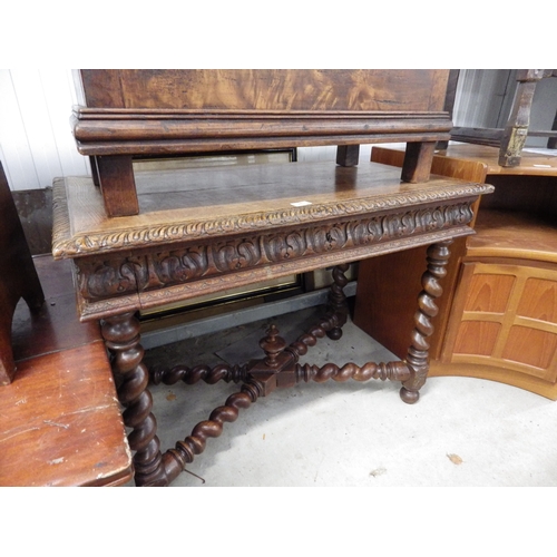 2457 - A late 19th century heavily carved oak barley-twist side table